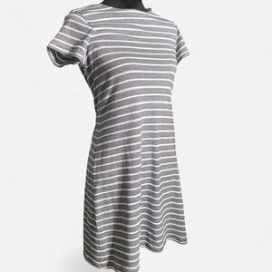 Sail to Sable navy blue and white horizontal striped dress with gold zipper